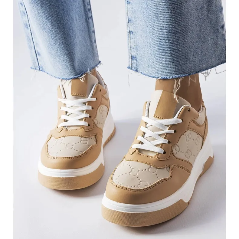 Beige sneakers decorated with Paré embossing