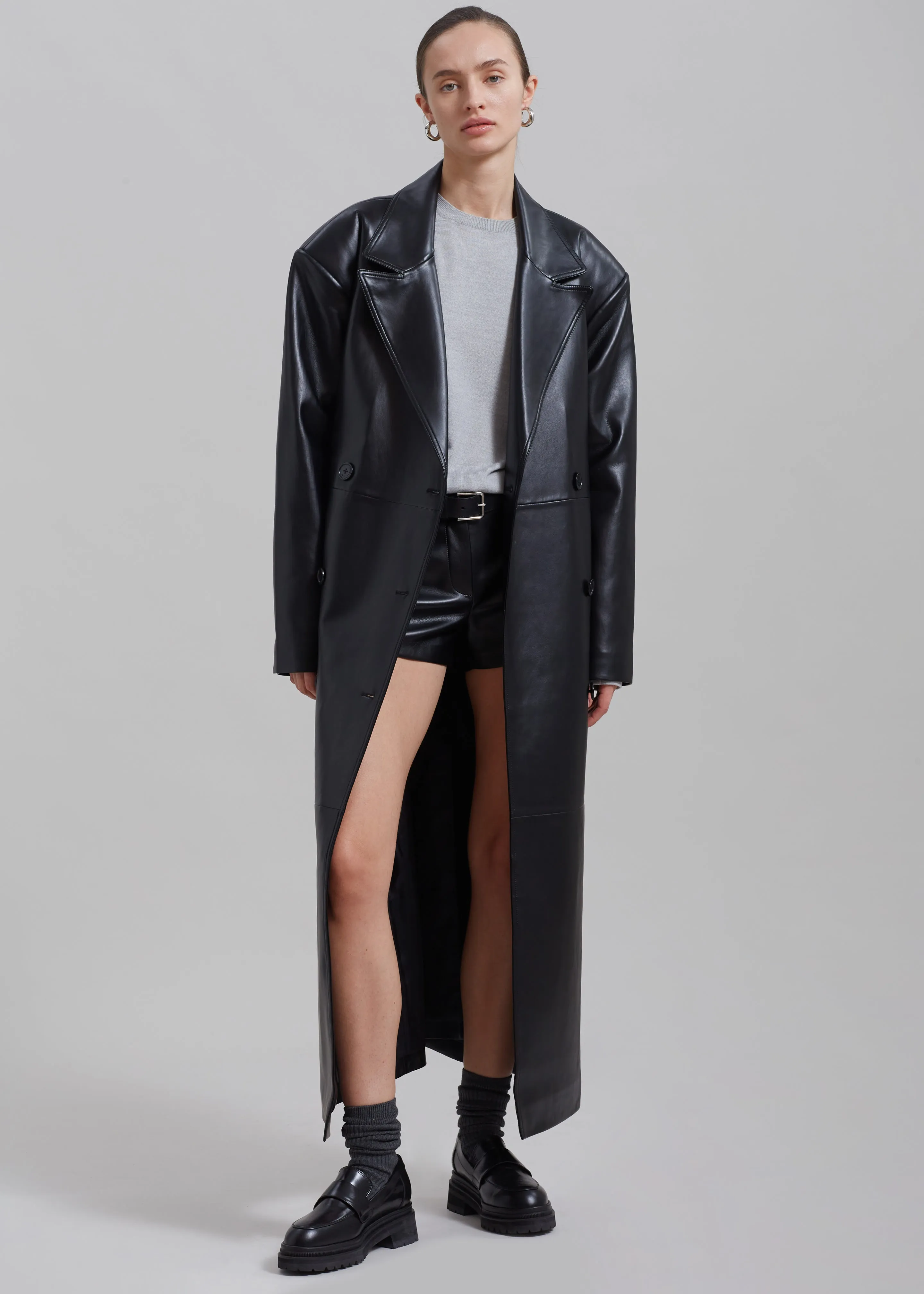 Black Faux Leather Trench Coat by Tina.