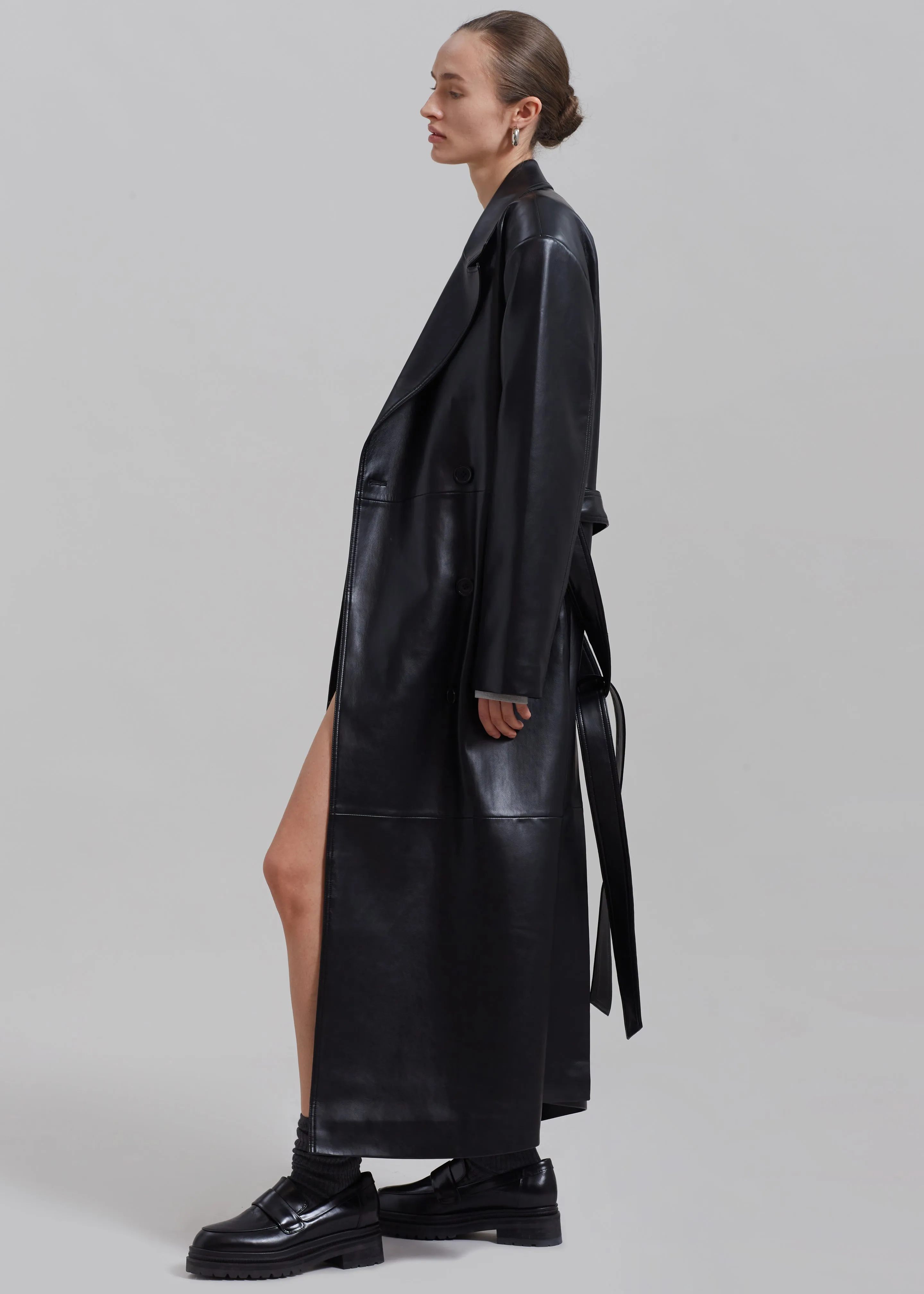 Black Faux Leather Trench Coat by Tina.