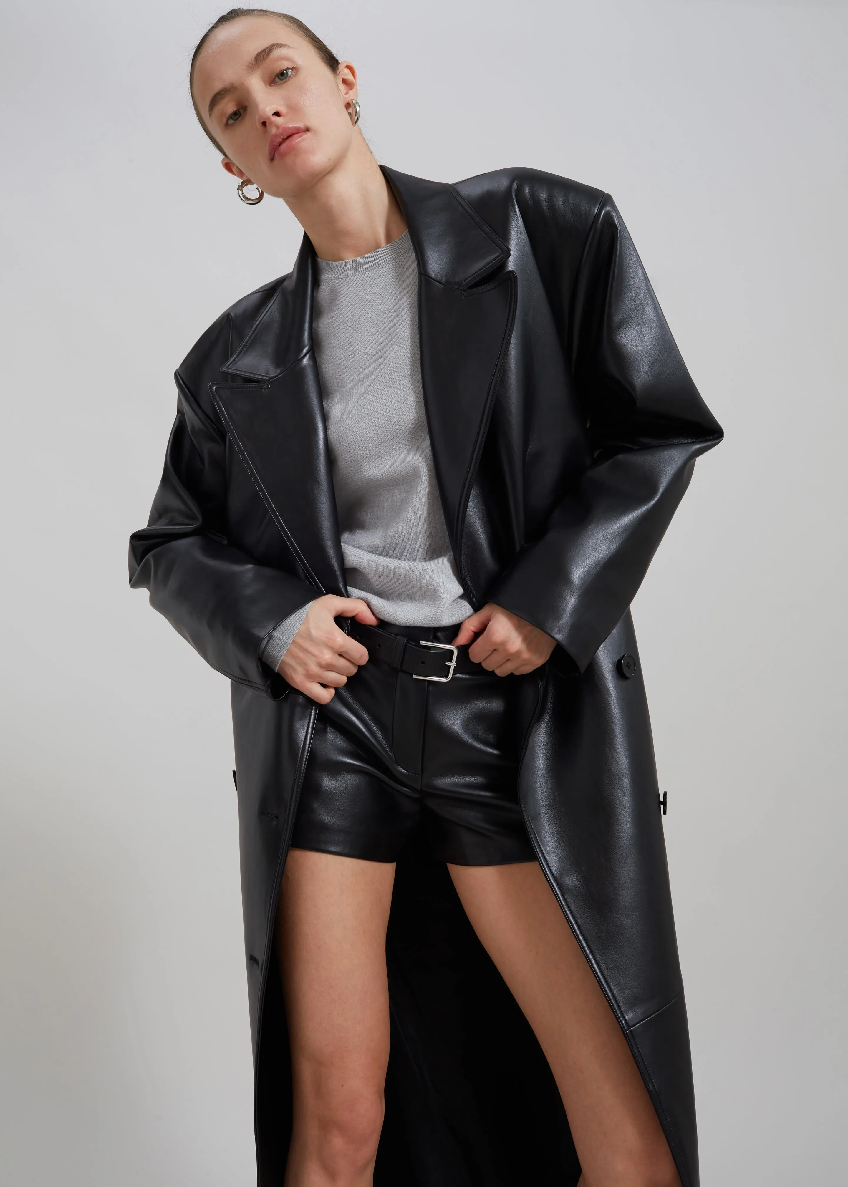 Black Faux Leather Trench Coat by Tina.