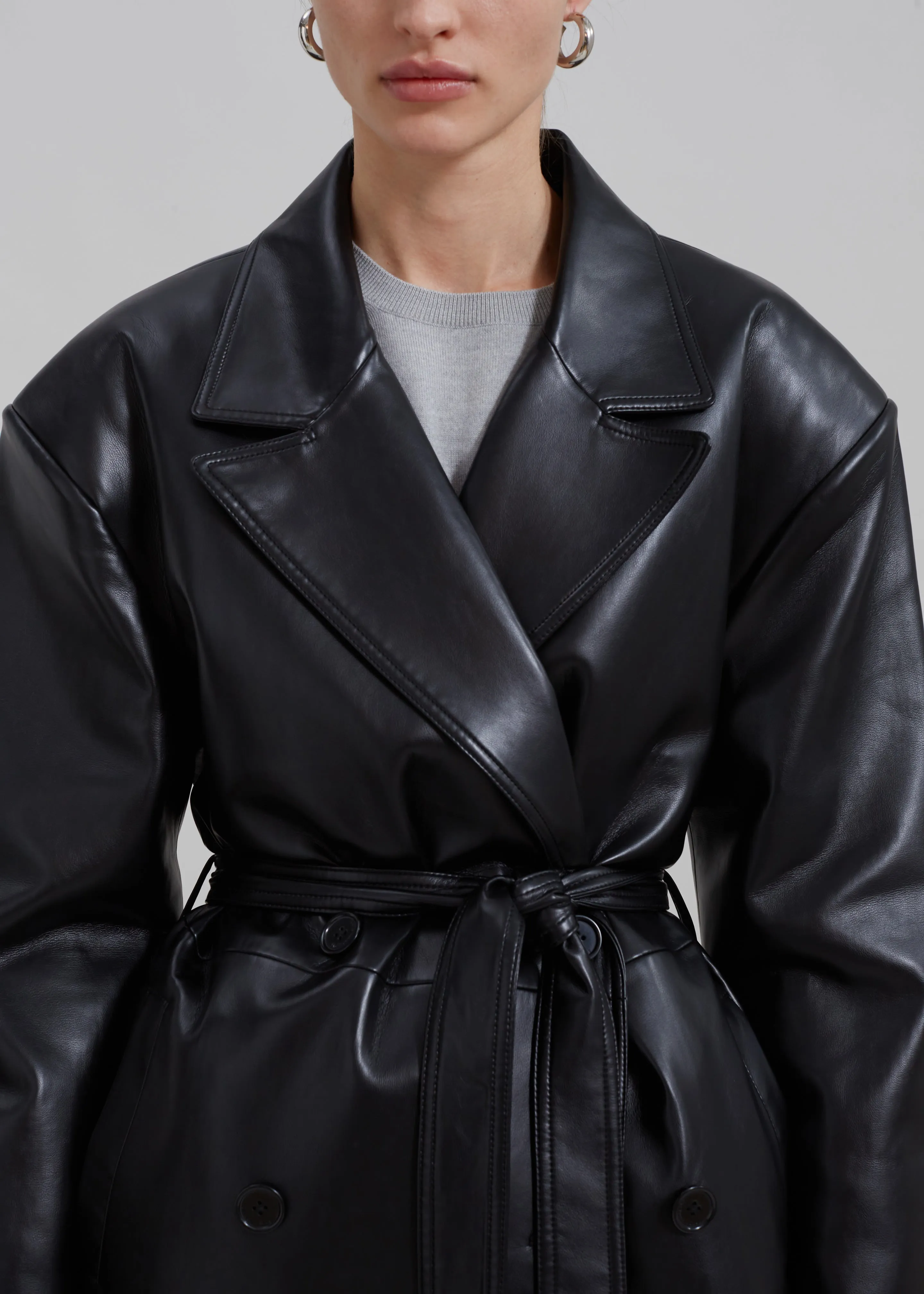 Black Faux Leather Trench Coat by Tina.