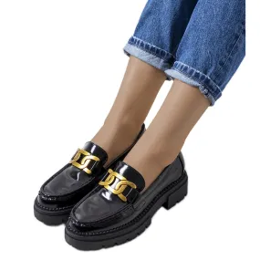 Black moccasins with elevated Dorland sole