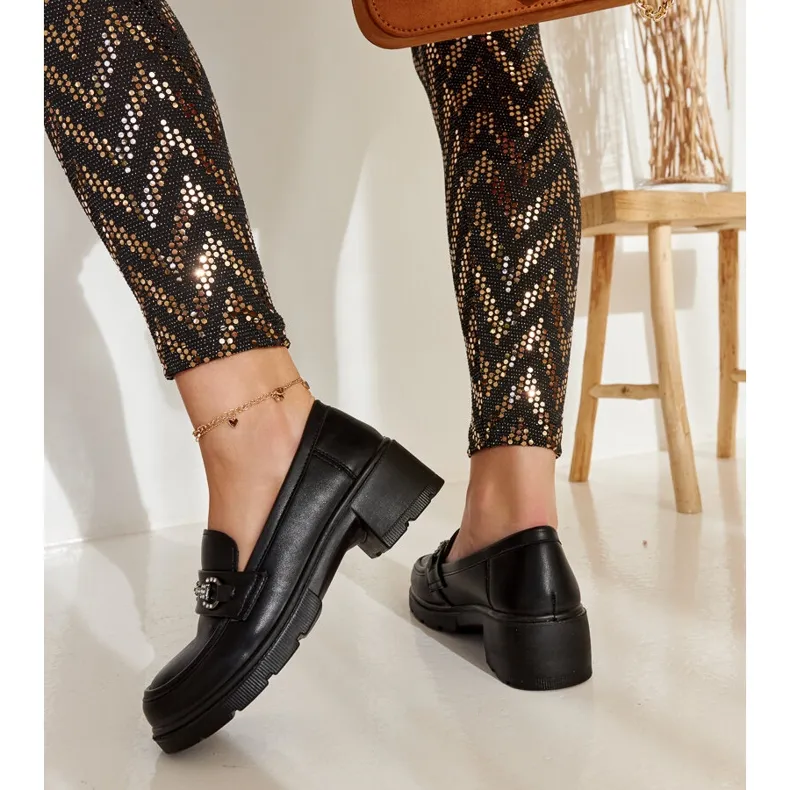 Black vegan leather Grisel moccasins.