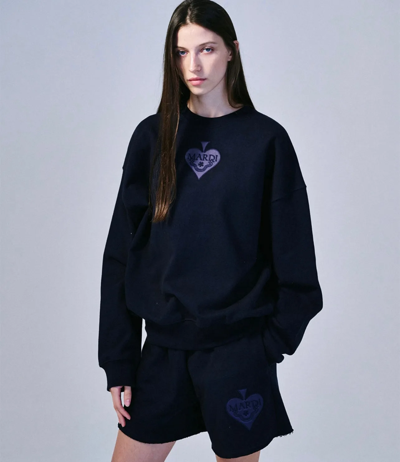 navy blue satin spade sweatshirt.