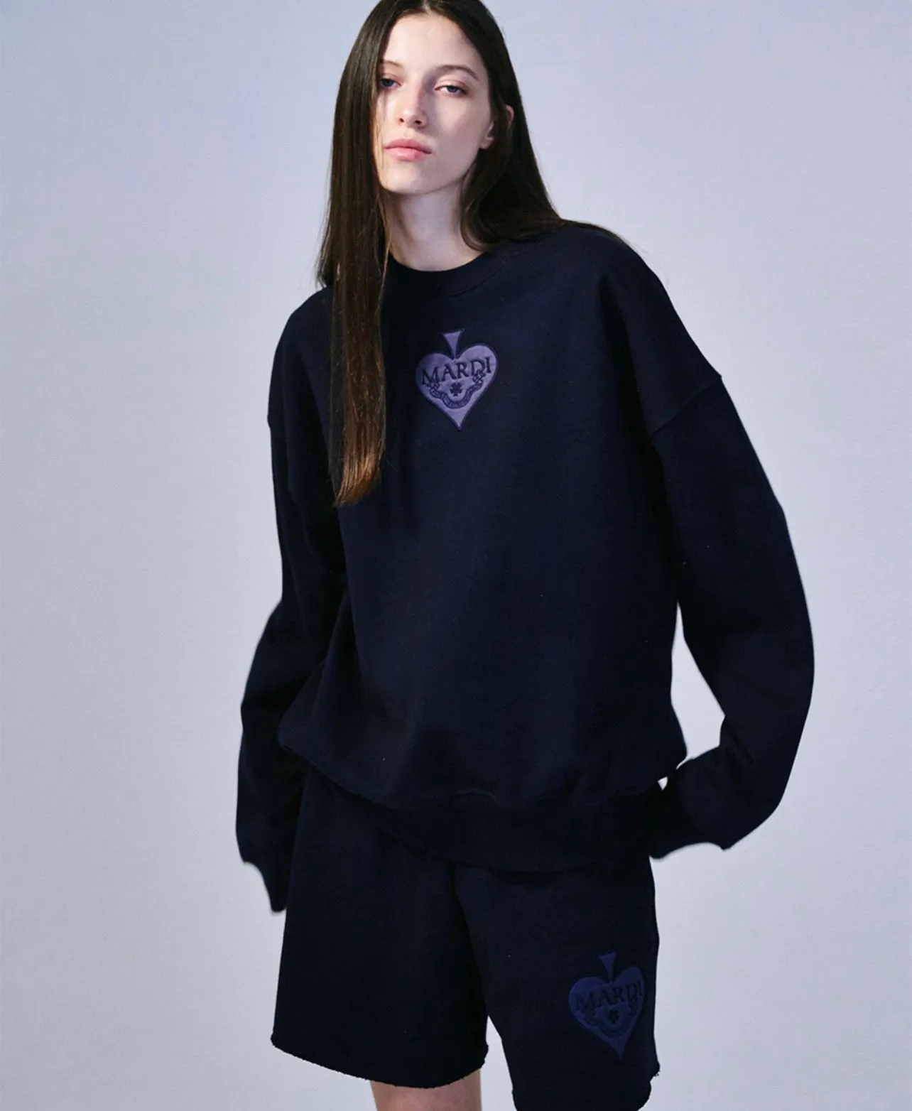 navy blue satin spade sweatshirt.