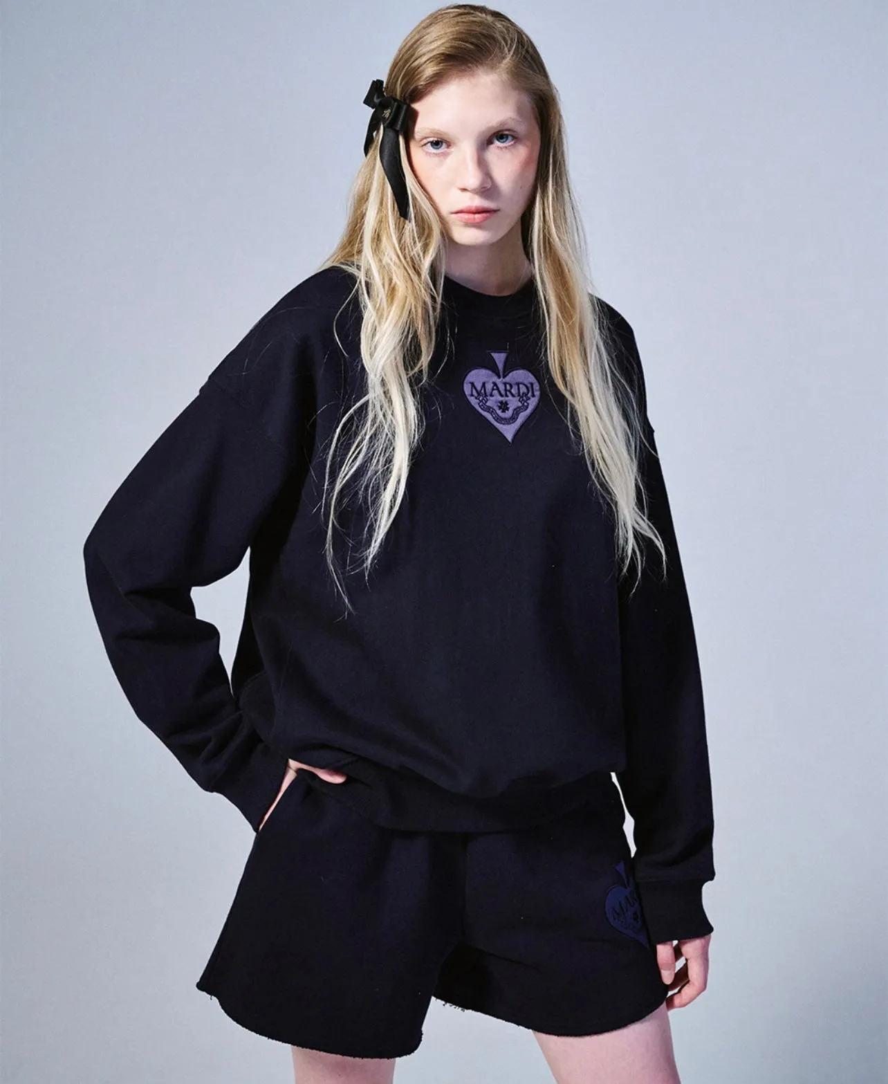 navy blue satin spade sweatshirt.