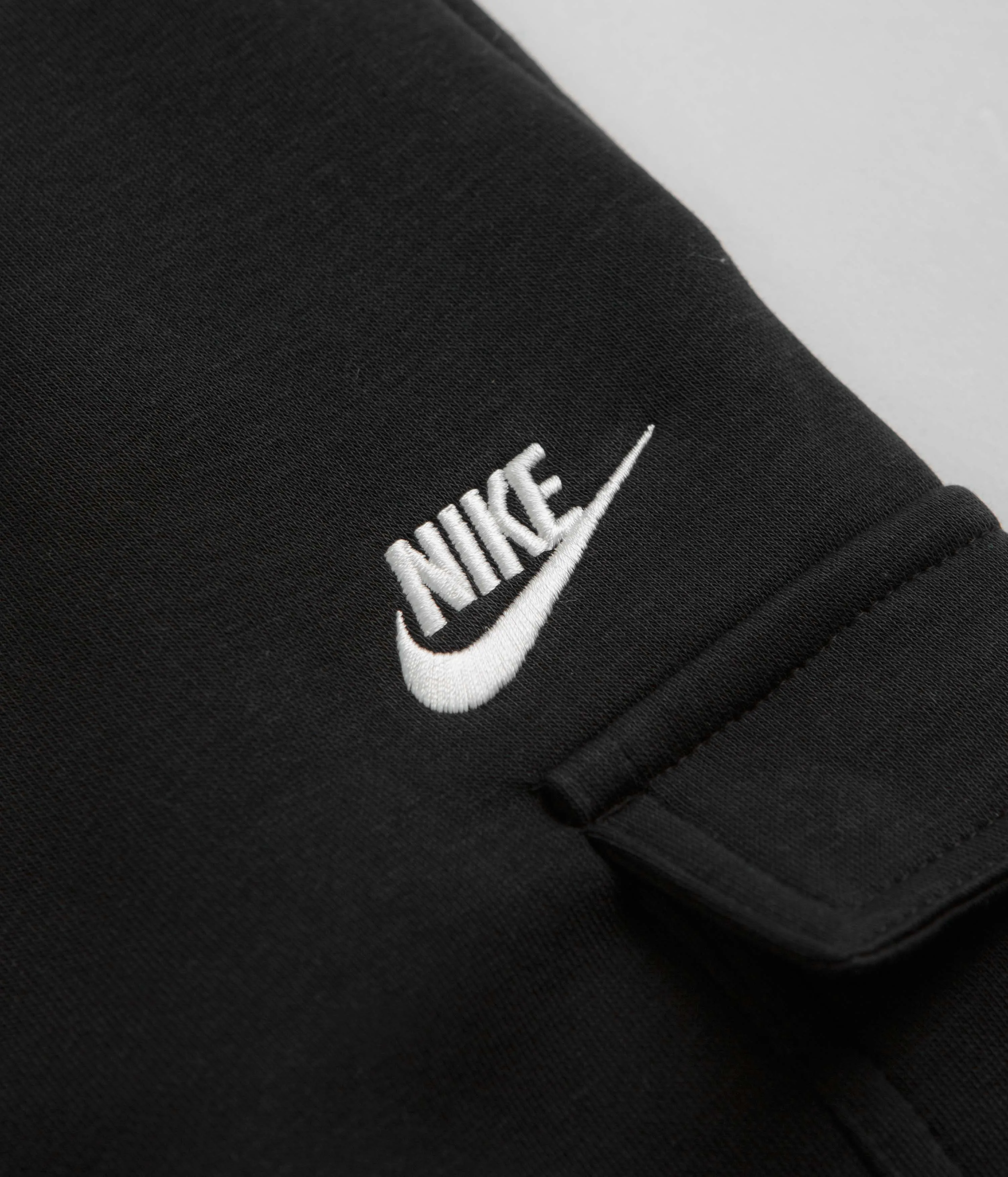 Nike Club Fleece Cargo Joggers in Black, Black, White.