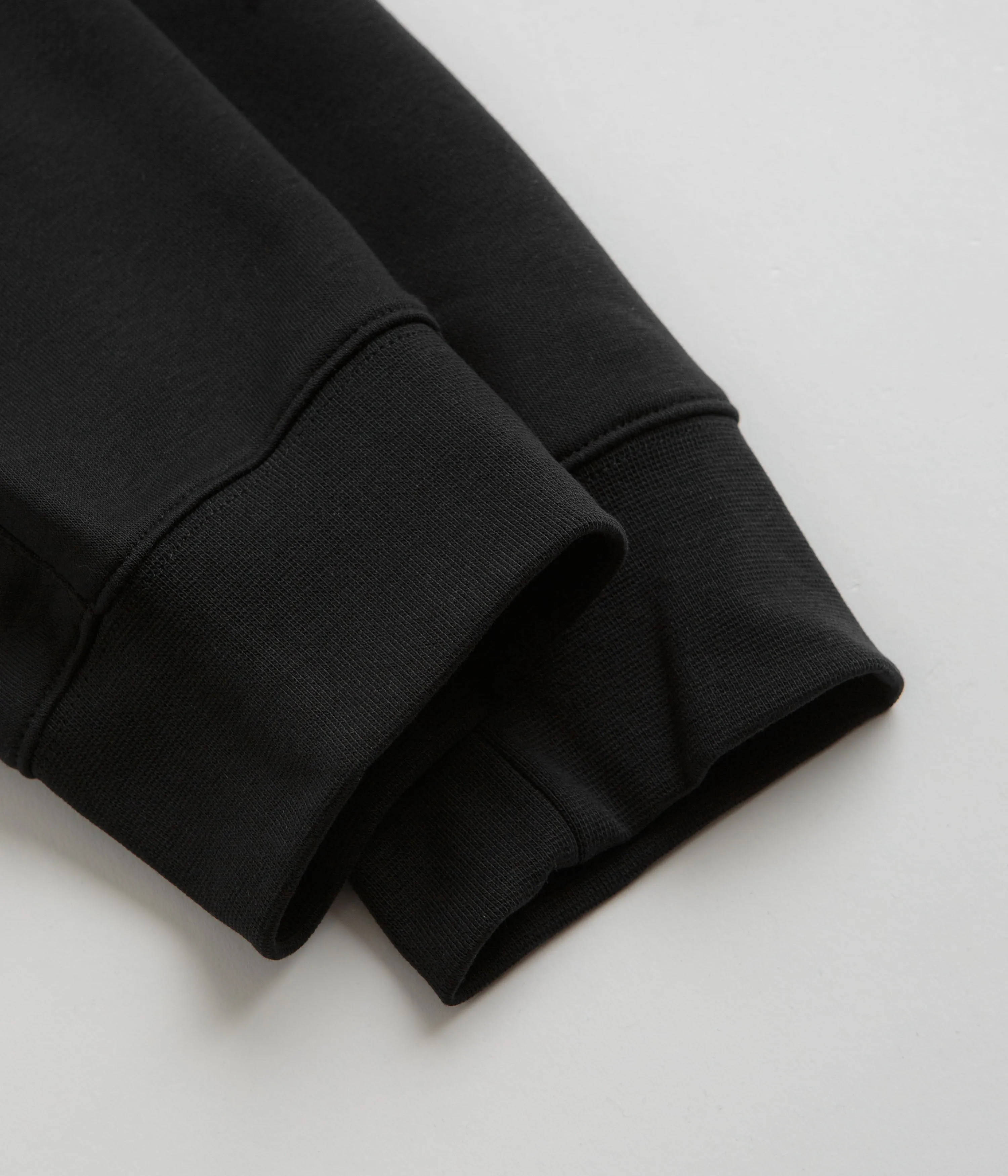 Nike Club Fleece Cargo Joggers in Black, Black, White.