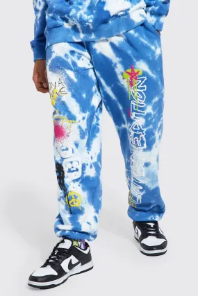 Oversized Graffiti Graphic Tie Dye Joggers | boohooMAN UK