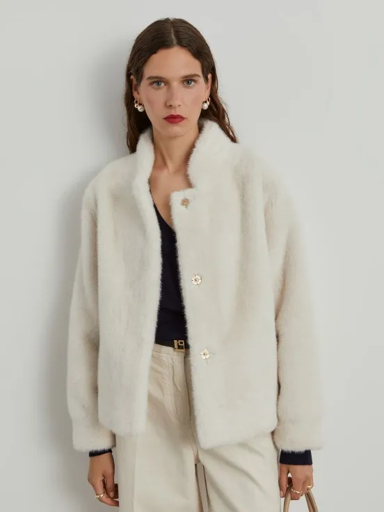 Pocketed fur coat.