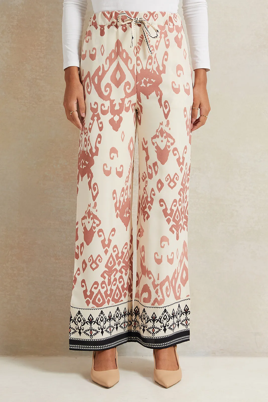 Women Cream Printed Wide Leg Trousers